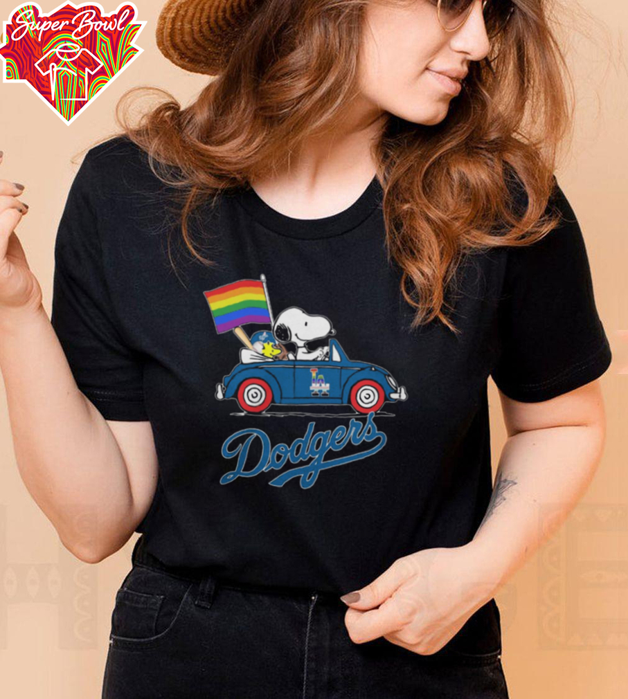 Los Angeles Dodgers x Snoopy x Woodstock Driving Car Pride Flag Tee Los Angeles Dodgers x Snoopy x Woodstock Driving Car Pride Flag Tee